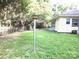 Backyard with lamp post and partial view of house at 237 W 3Rd St, Kershaw, SC 29067