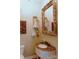 Bathroom boasts an ornate mirror and marble vanity at 4642 King Crowder Dr, Gastonia, NC 28052