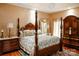Elegant Primary bedroom with a four-poster bed and ample furniture at 4642 King Crowder Dr, Gastonia, NC 28052