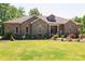 Brick home with large front yard and mature trees at 4642 King Crowder Dr, Gastonia, NC 28052