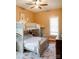 Quaint bedroom with a bunk bed and window seat at 4642 King Crowder Dr, Gastonia, NC 28052