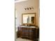 Large bathroom with double vanity and ornate mirror at 4642 King Crowder Dr, Gastonia, NC 28052
