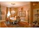 Formal dining room featuring hardwood floors, chandelier, and ornate furniture at 4642 King Crowder Dr, Gastonia, NC 28052