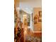 Long hallway with hardwood floors and decorative wall art at 4642 King Crowder Dr, Gastonia, NC 28052