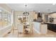 Bright kitchen features a breakfast nook and ample cabinet space at 4023 Randolph Rd, Charlotte, NC 28211