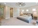 Comfortable guest bedroom with neutral decor and ample closet space at 4023 Randolph Rd, Charlotte, NC 28211