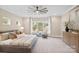 Spacious primary bedroom with large windows and sitting area at 4023 Randolph Rd, Charlotte, NC 28211