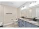 Clean bathroom with double vanity and updated fixtures at 4023 Randolph Rd, Charlotte, NC 28211