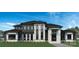 Two-story home with dark siding, white accents, and a three-car garage at 628 Wisteria Vines Trl # 6, Fort Mill, SC 29708