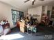 Living room with fireplace and lots of storage boxes at 100 Springs Ct, Stony Point, NC 28678