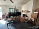 Living room with fireplace and lots of clutter at 100 Springs Ct, Stony Point, NC 28678