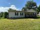 Single wide mobile home with covered porch and yard at 100 Springs Ct, Stony Point, NC 28678
