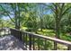 Deck view of large backyard with mature trees at 810 Hampton St, Shelby, NC 28152