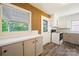 Kitchen with stove, cabinets and wood flooring at 810 Hampton St, Shelby, NC 28152