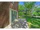Brick patio with pergola and swing bench, great for outdoor relaxation at 810 Hampton St, Shelby, NC 28152