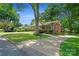 Ranch house with driveway and mature trees at 810 Hampton St, Shelby, NC 28152