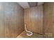 Unfinished basement area with wood paneling at 810 Hampton St, Shelby, NC 28152