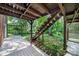 Stairs leading up to a deck overlooking the backyard at 810 Hampton St, Shelby, NC 28152