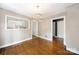 Dining room with hardwood floors and a view of the kitchen at 810 Hampton St, Shelby, NC 28152
