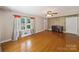 Living room with hardwood floors and a piano at 810 Hampton St, Shelby, NC 28152