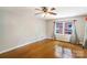 Spacious bedroom with hardwood floors and large windows at 810 Hampton St, Shelby, NC 28152