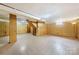 Finished basement features tile floors and wood paneling at 810 Hampton St, Shelby, NC 28152