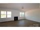 Spacious living room with fireplace and hardwood floors at 15500 Nc Hwy 73 Hwy, Huntersville, NC 28078