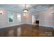Elegant dining room with hardwood floors and a tray ceiling at 2708 Chilton Pl, Charlotte, NC 28207