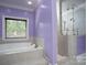 Bathroom with soaking tub and separate shower at 2708 Chilton Pl, Charlotte, NC 28207