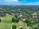 Aerial view of home nestled on a golf course at 2708 Chilton Pl, Charlotte, NC 28207