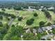 Aerial view showing home's location on golf course at 2708 Chilton Pl, Charlotte, NC 28207