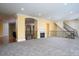 Large bonus room with fireplace and views overlooking the lower level at 2708 Chilton Pl, Charlotte, NC 28207