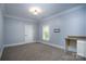 Versatile bedroom with built-in workspace and neutral carpeting at 2708 Chilton Pl, Charlotte, NC 28207