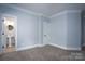Spacious bedroom with an ensuite bathroom and neutral decor at 2708 Chilton Pl, Charlotte, NC 28207
