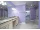 Spa-like bathroom with double vanity and walk-in shower at 2708 Chilton Pl, Charlotte, NC 28207