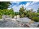 Private balcony with patio furniture and treetop views at 2708 Chilton Pl, Charlotte, NC 28207