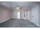 Spacious bedroom with plush carpet and ample closet space at 2708 Chilton Pl, Charlotte, NC 28207