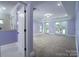 Main bedroom with access to private bathroom and balcony at 2708 Chilton Pl, Charlotte, NC 28207