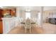 Dining room with a large table and hardwood flooring at 3040 Gilroy Dr, Indian Land, SC 29707