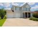 Two-story house with double garage and landscaped lawn at 3040 Gilroy Dr, Indian Land, SC 29707