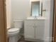 Simple bathroom with white vanity and toilet at 200 Olin Loop, Olin, NC 28660