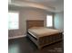 Main bedroom with large bed and window at 2044 Sweet William Dr, Harrisburg, NC 28075