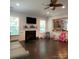 Living room with fireplace and open floor plan at 2044 Sweet William Dr, Harrisburg, NC 28075
