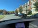 Row of townhouses with parking in front at 9416 Sandburg Ave, Charlotte, NC 28213