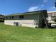Tan house with AC unit and steps at 9416 Sandburg Ave, Charlotte, NC 28213