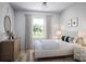 Bedroom with a comfortable bed and plenty of natural light at 1008 Briar Well St, Mint Hill, NC 28227
