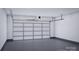 Spacious garage with automatic door opener at 1008 Briar Well St, Mint Hill, NC 28227