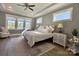 Main bedroom with water views, hardwood floors and plenty of natural light at 001 Beatties Ford Rd, Huntersville, NC 28078