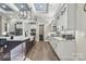 Spacious kitchen featuring modern cabinetry, a large island, and stainless steel appliances at 001 Beatties Ford Rd, Huntersville, NC 28078