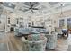 Open floor plan great room with high ceilings, hardwood floors, and a cozy seating area at 001 Beatties Ford Rd, Huntersville, NC 28078